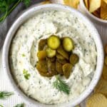 The Best Dill Pickle Dip with Cottage Cheese Recipe You’ll Ever Try 9 Dill pickle dip with cottage cheese served in a bowl with fresh dill