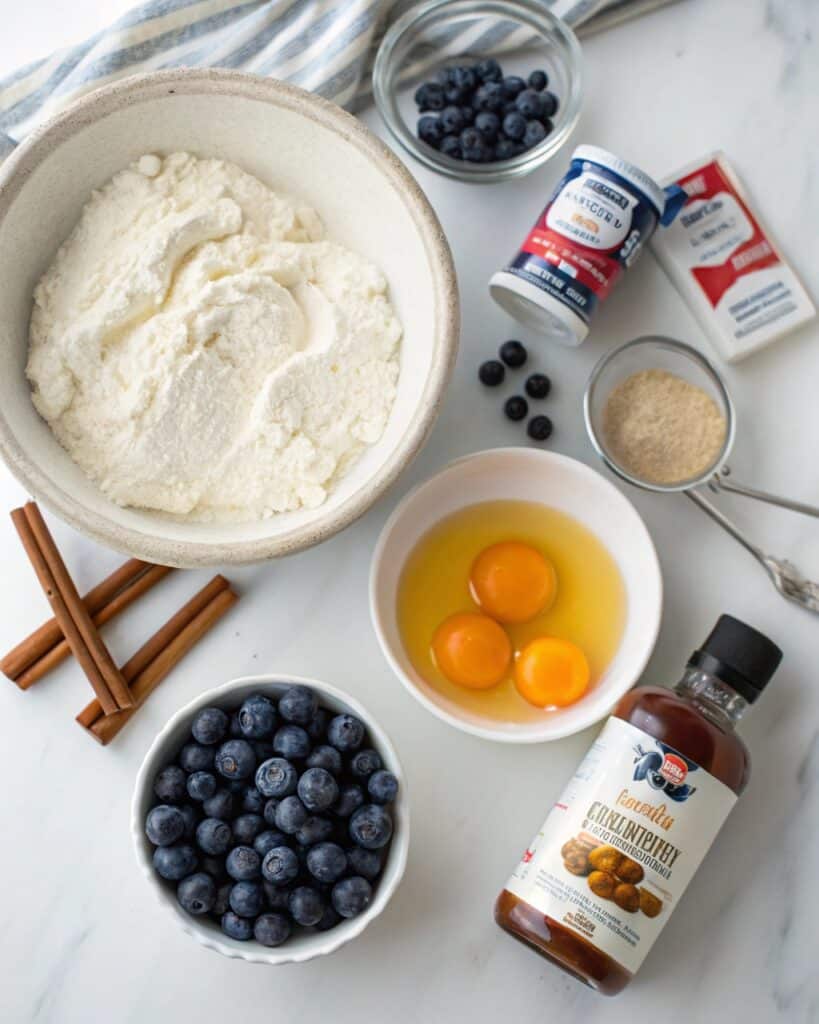 Cottage Cheese Blueberry Cloud Bread: The Ultimate High-Protein, Low-Carb Delight 5 ingredients for cottage cheese blueberry cloud bread on marble surface